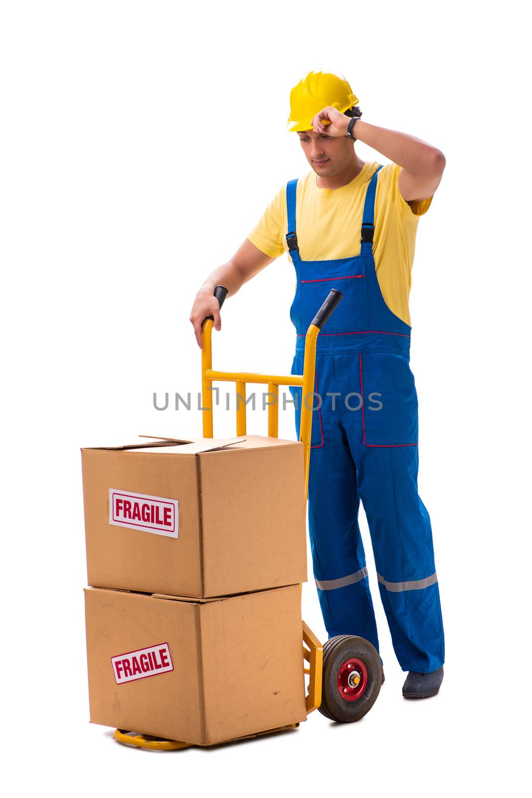 Young contractor with fragile boxes isolated on white