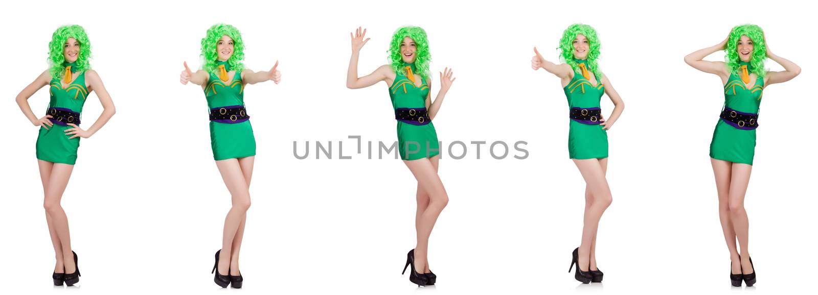 Young woman in green mini dress isolated on white