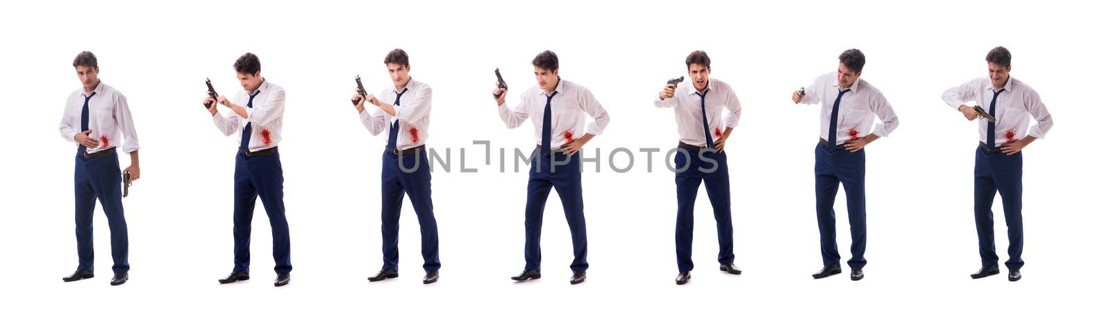 Businessman wounded in gun fight isolated on white by Elnur