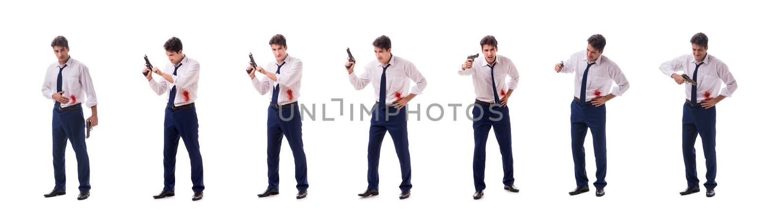 Businessman wounded in gun fight isolated on white