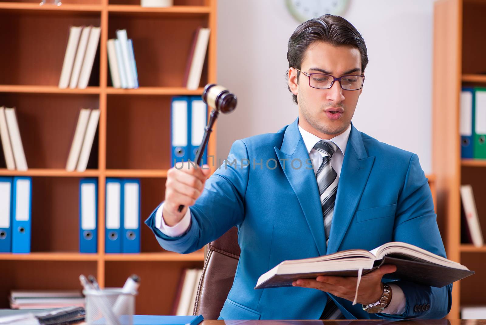 Lawyer working in the office by Elnur