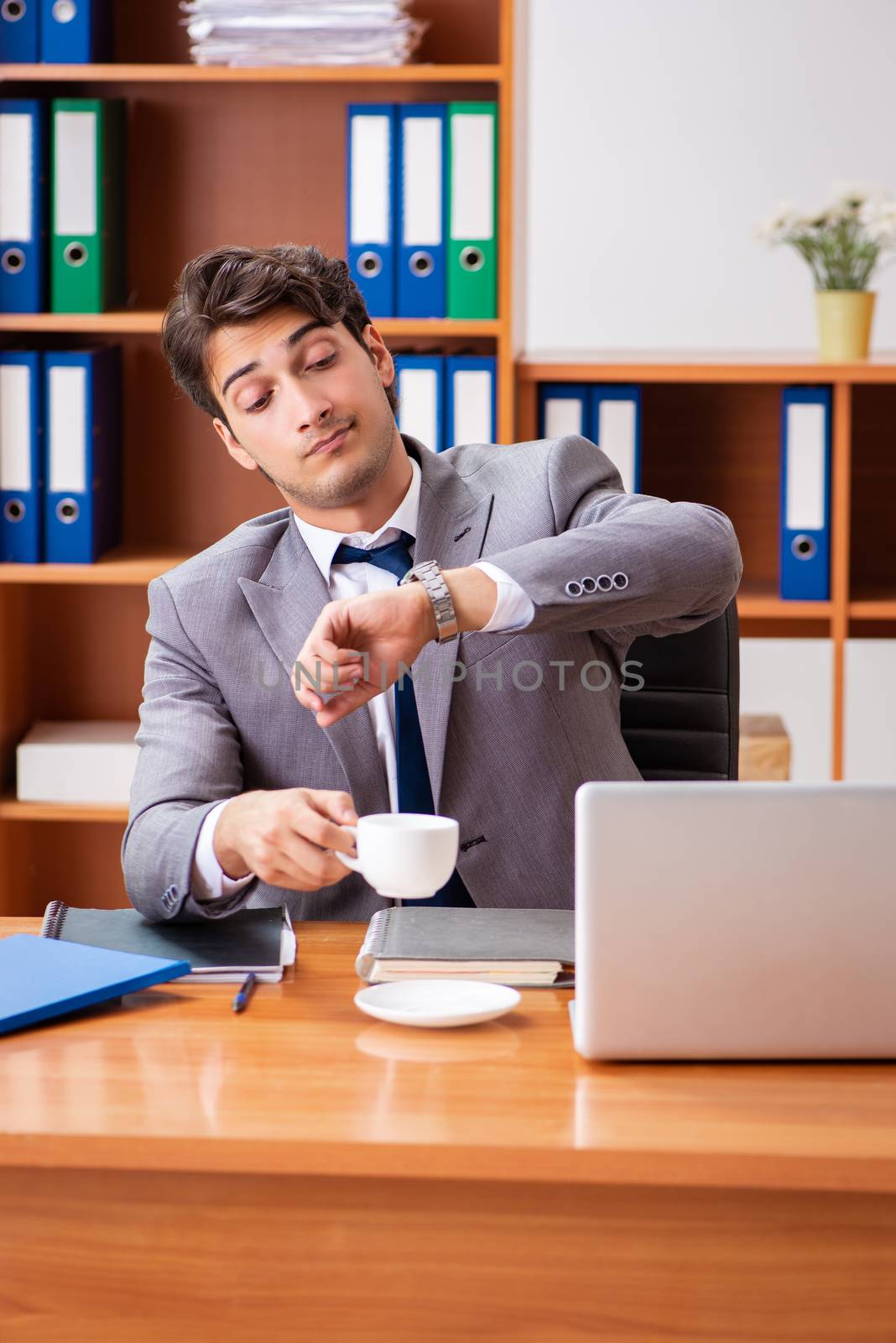 Young employee working in the office