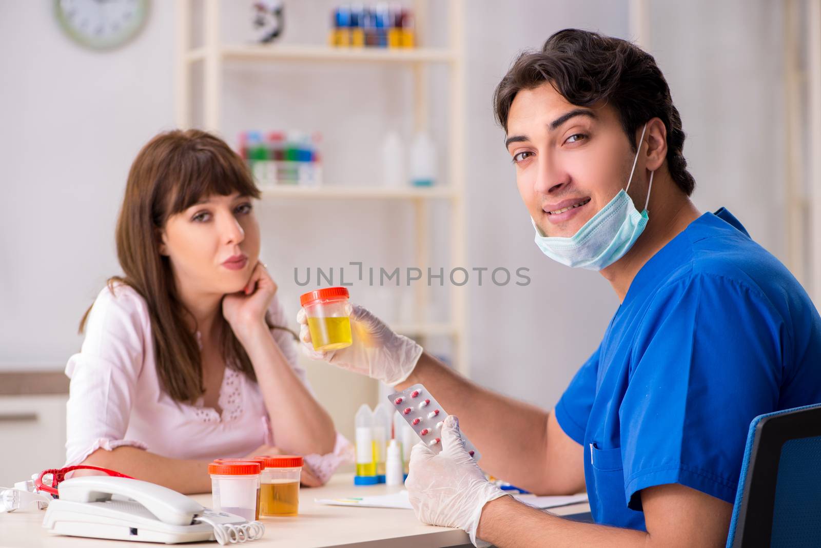 Patient visiting doctor for urine test by Elnur