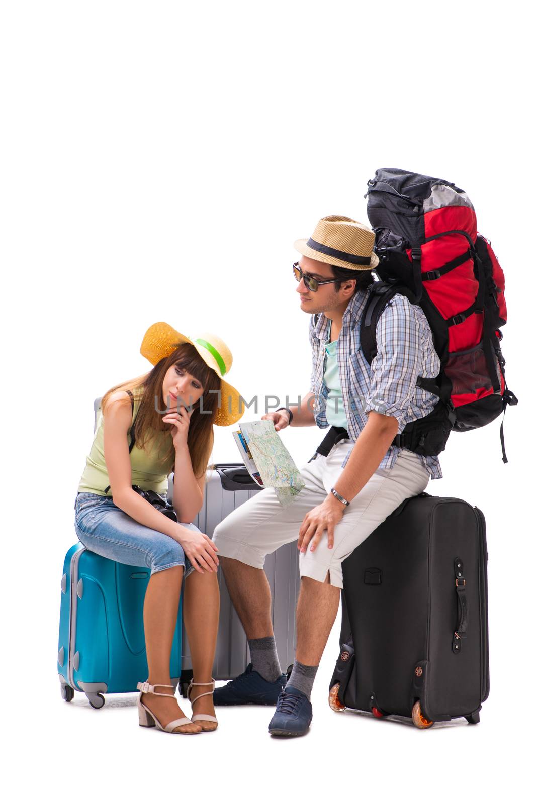 Young family preparing for vacation travel on white