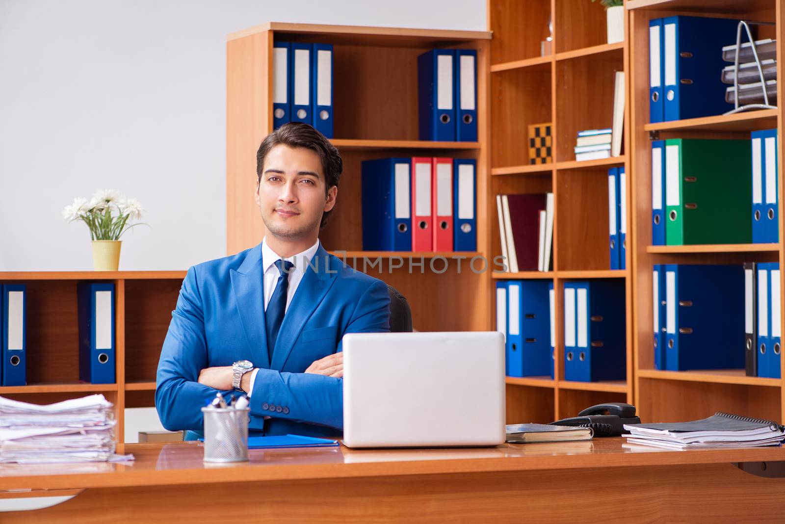 Young employee working in the office