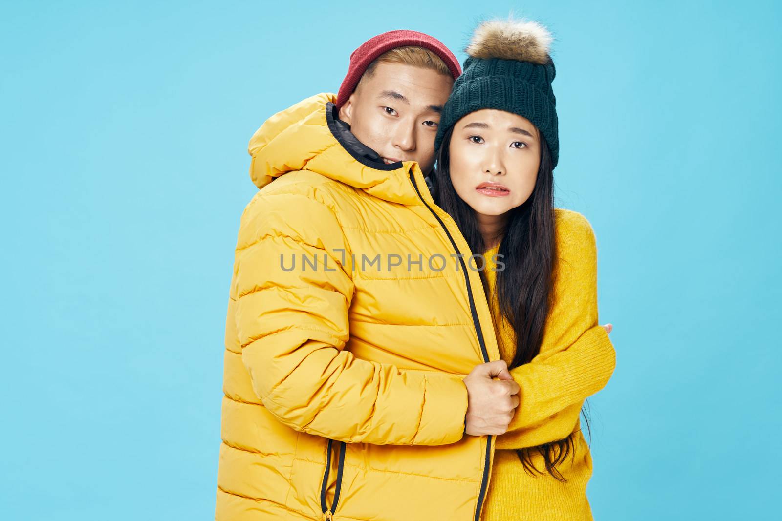 Frozen man and woman winter lifestyle embrace family by SHOTPRIME