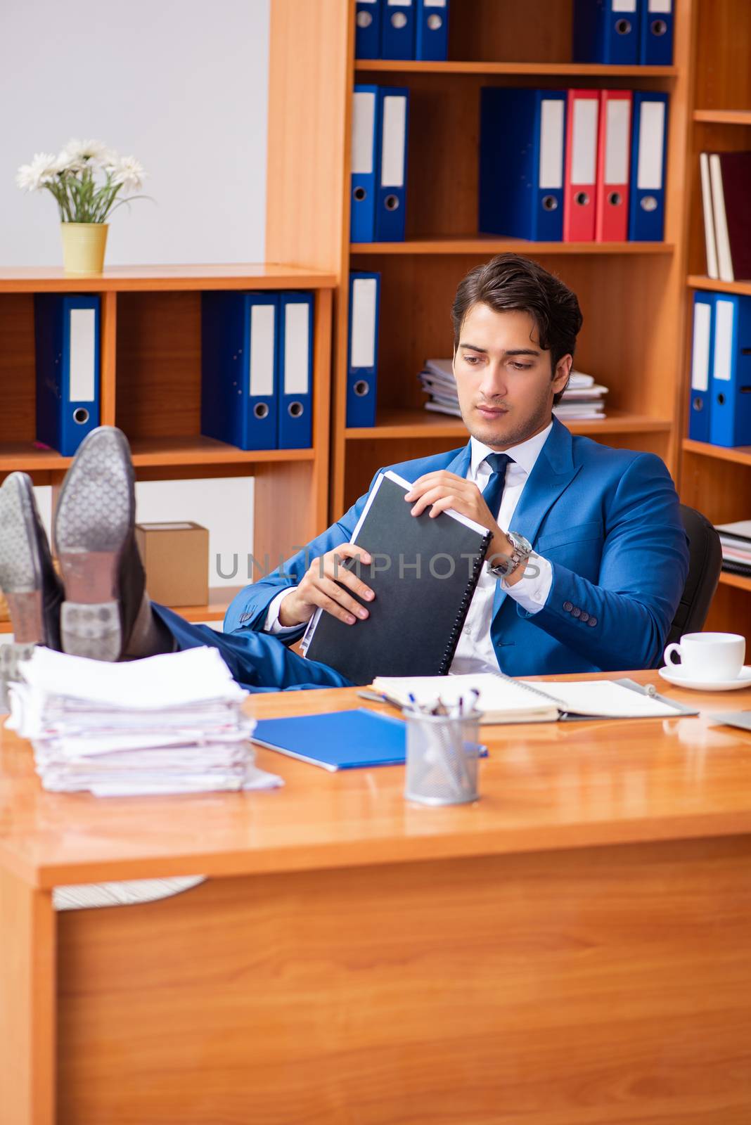 Young employee working in the office