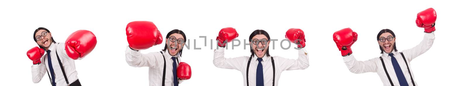 Funny young  businessman with boxing gloves isolated on white