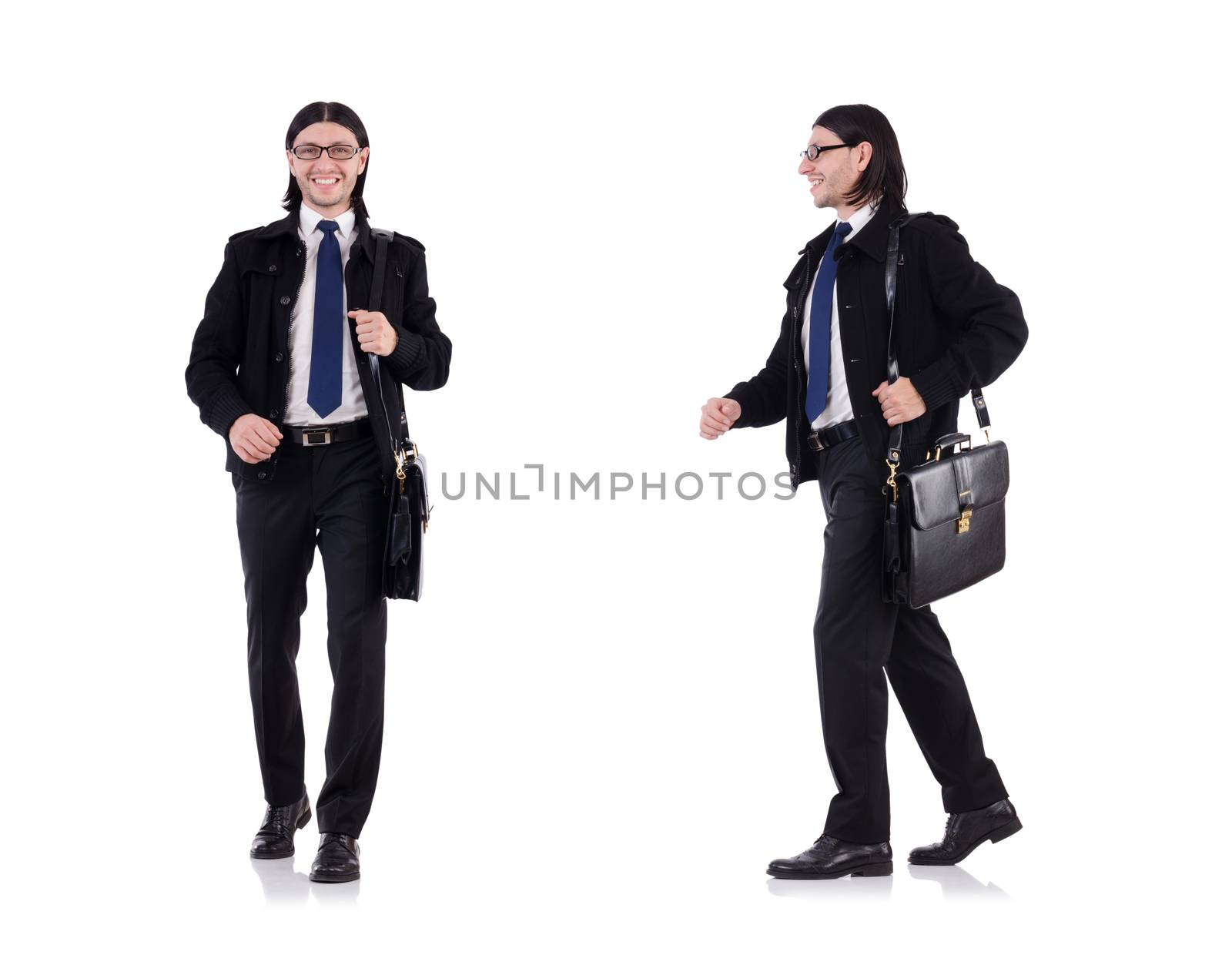 Young businessman holding briefcase isolated on white