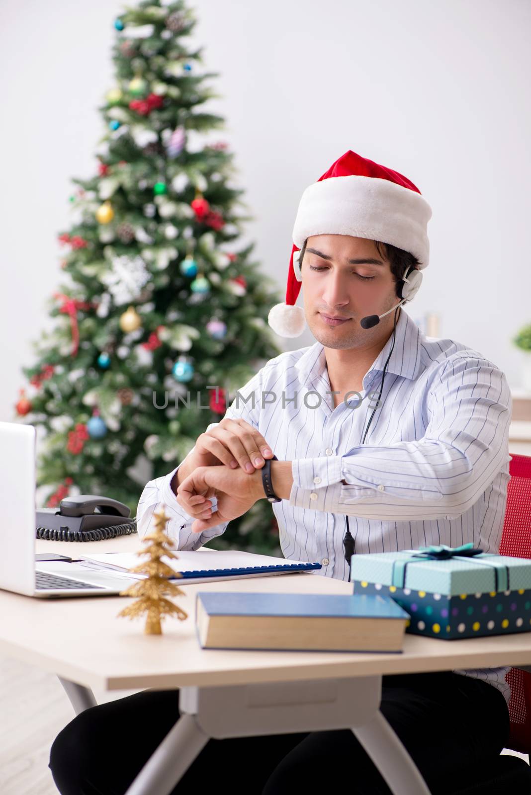 Telesales operator during christmas sale on the phone