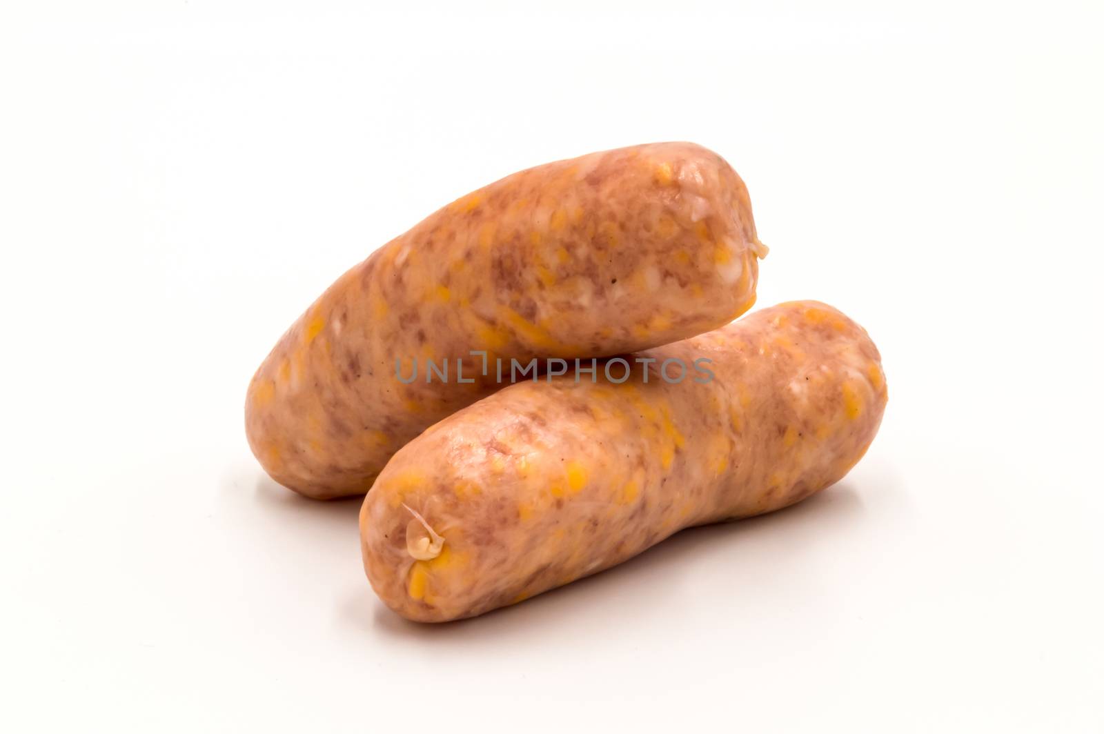 two white sausages with raw cheese on a white background