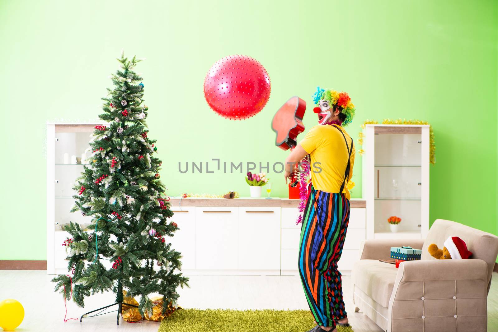 Funny clown in Christmas celebration concept  by Elnur