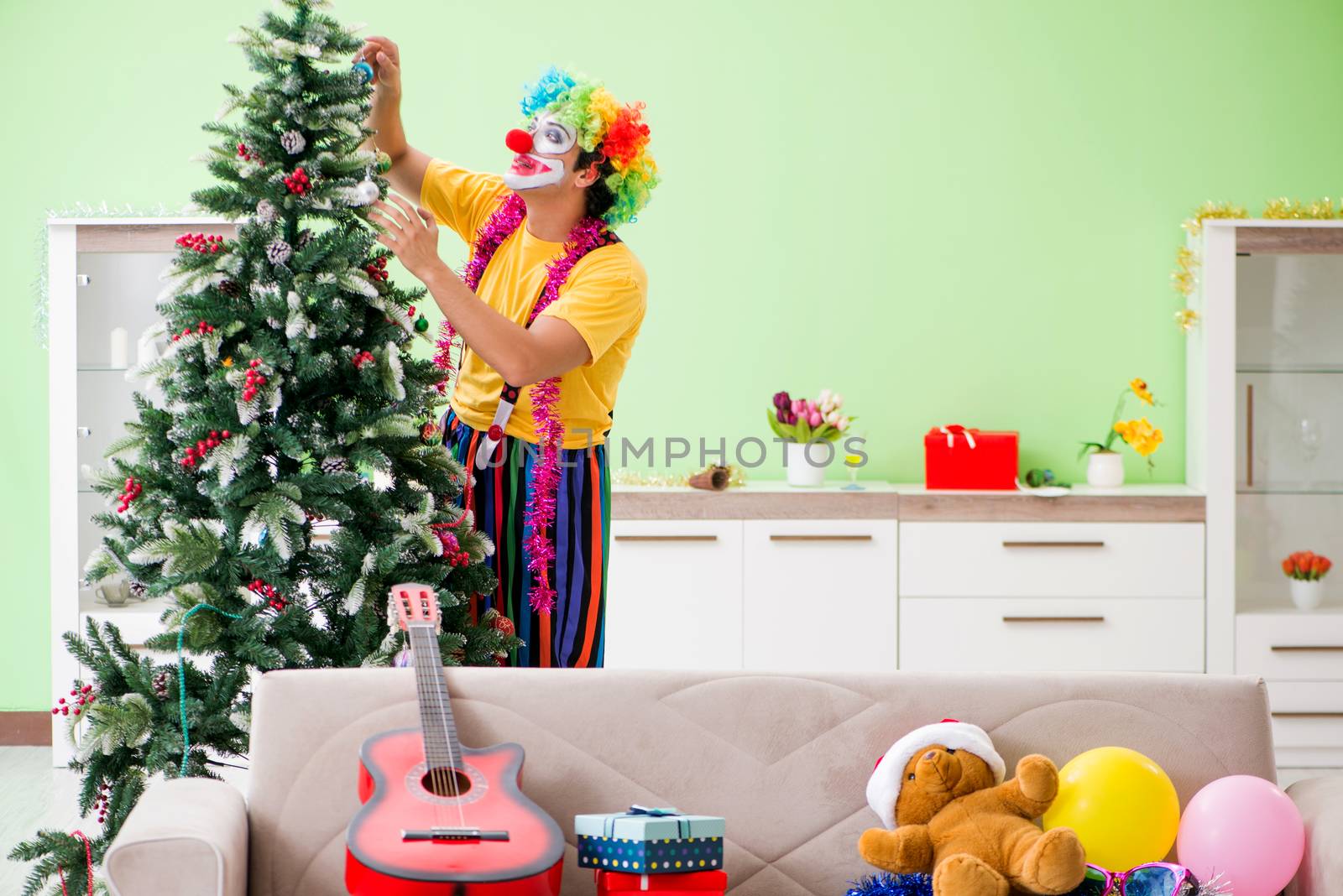 Funny clown in Christmas celebration concept 