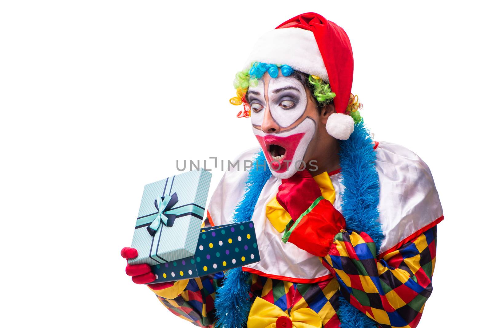 Young funny clown comedian isolated on white  by Elnur