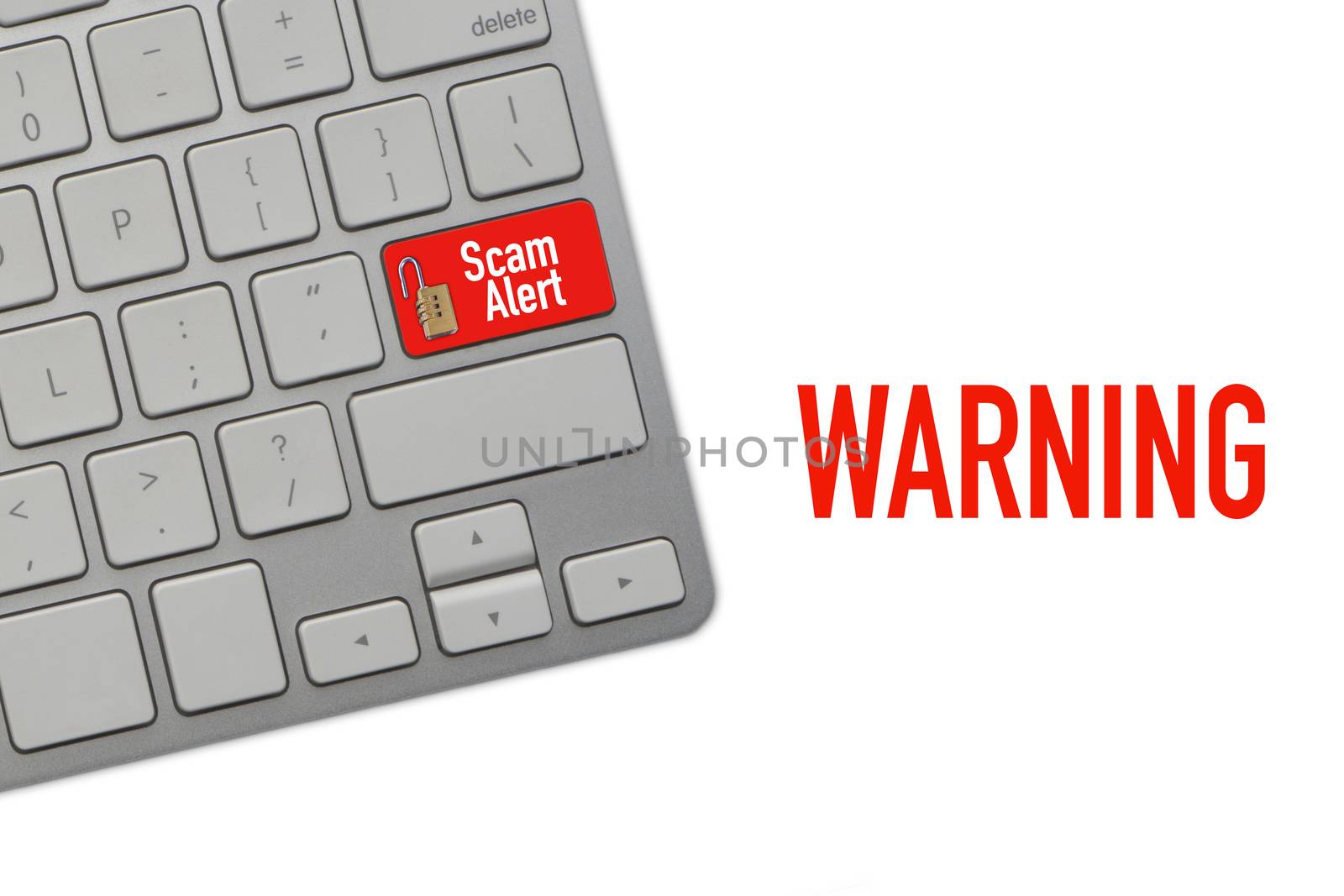 WARNING SCAM ALERT text on computer keyboard over white background by silverwings
