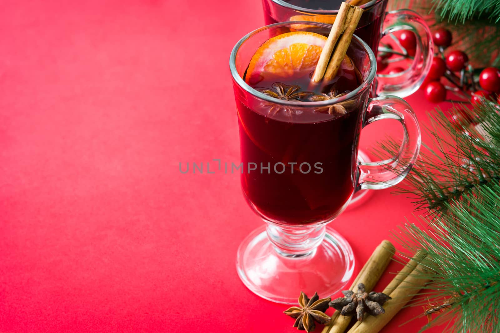 Christmas mulled wine on red background