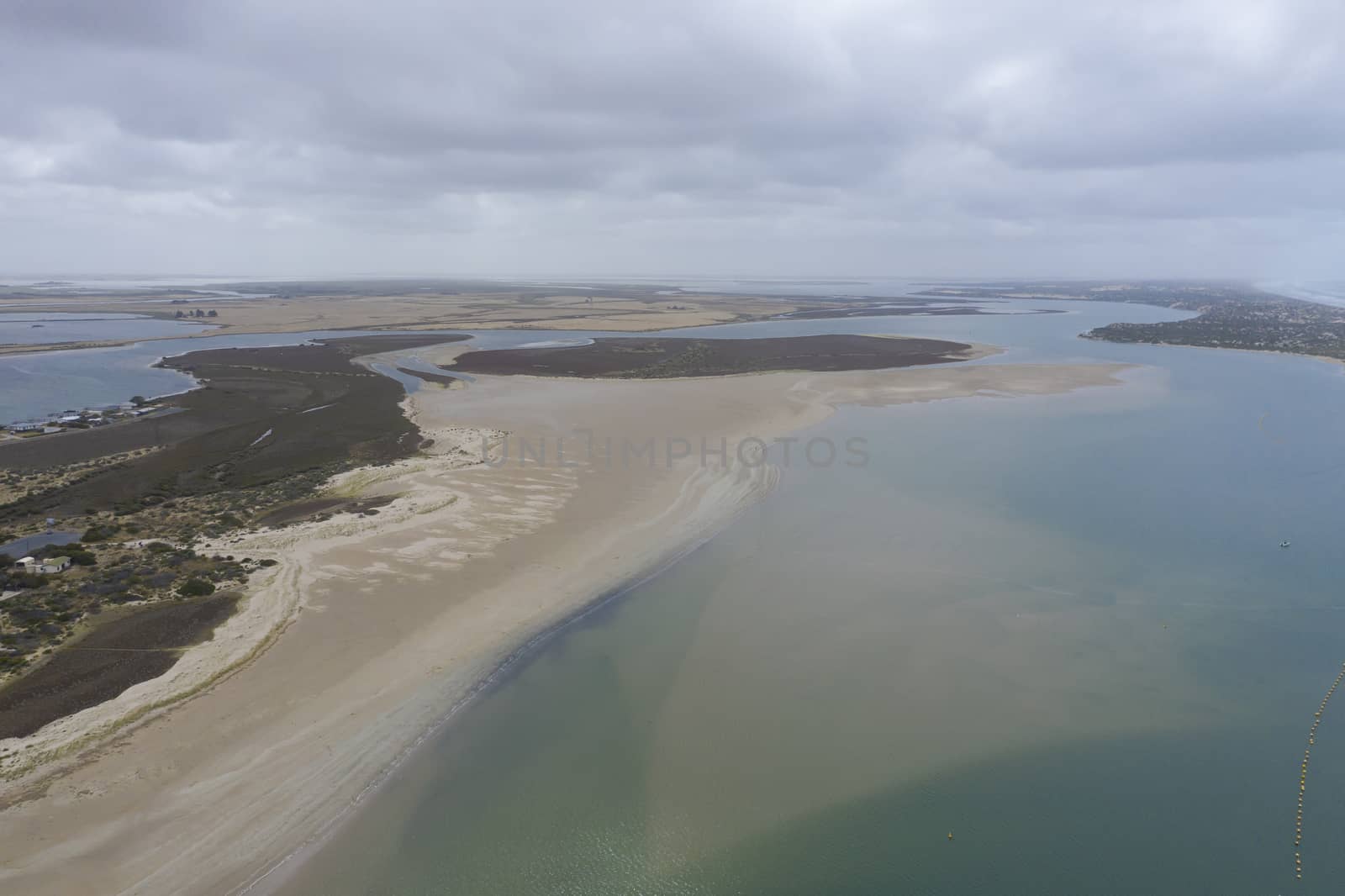 Aerial view of the mouth of the River Murray in regional South Australia in Australia by WittkePhotos