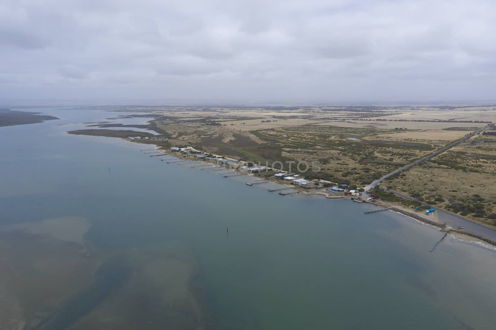 Aerial view of the mouth of the River Murray in regional South Australia in Australia by WittkePhotos