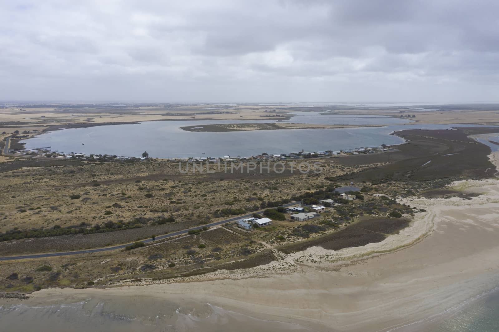 Aerial view of sand dunes at the mouth of the River Murray in regional South Australia in Australia by WittkePhotos