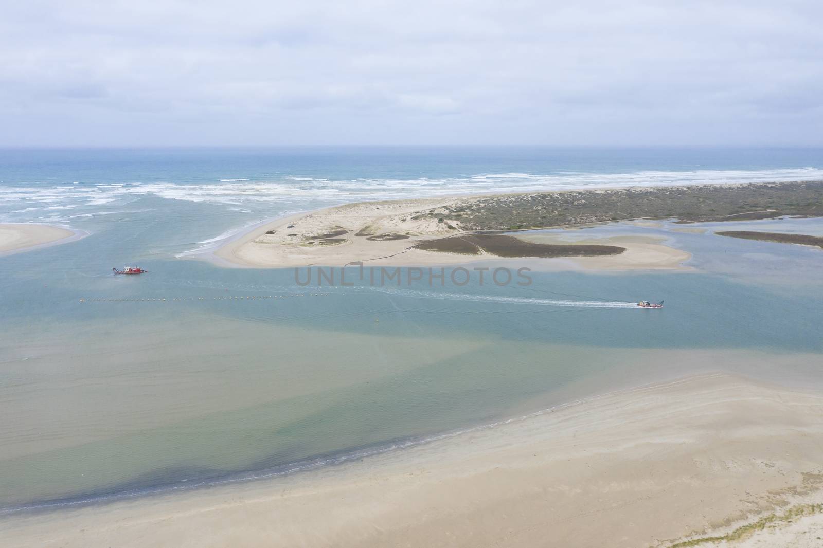 Aerial view of the mouth of the River Murray in regional South Australia in Australia by WittkePhotos