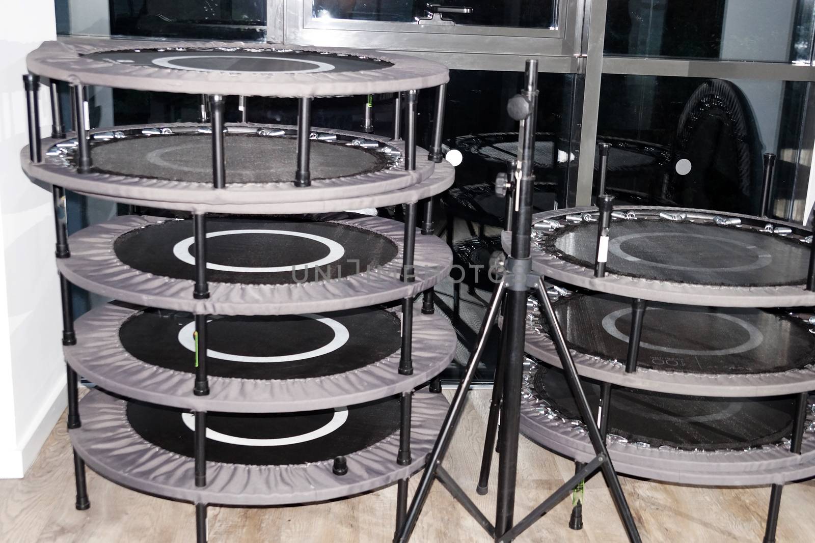 folded fitness trampolines in the gym