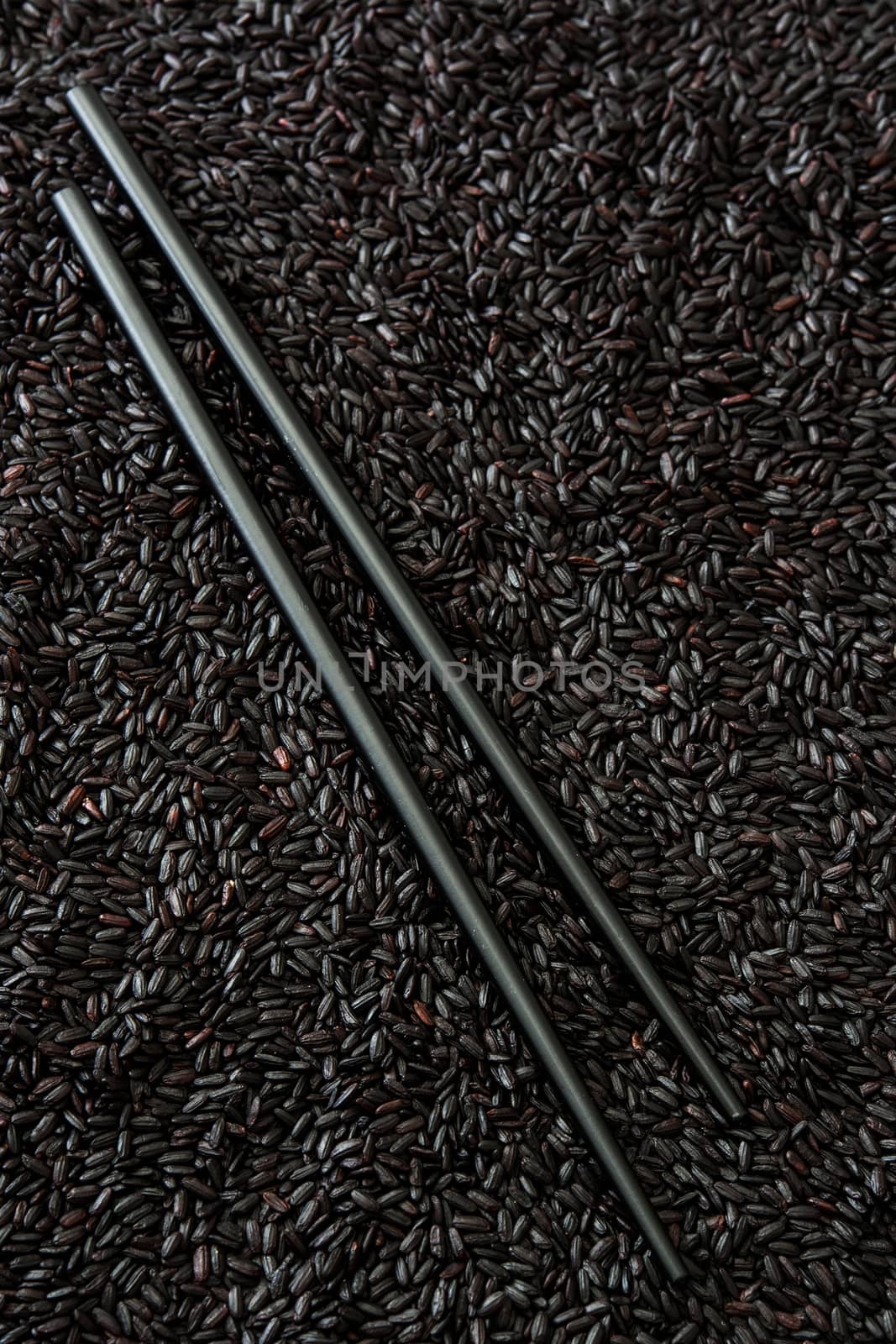 Black chopstick black rice background