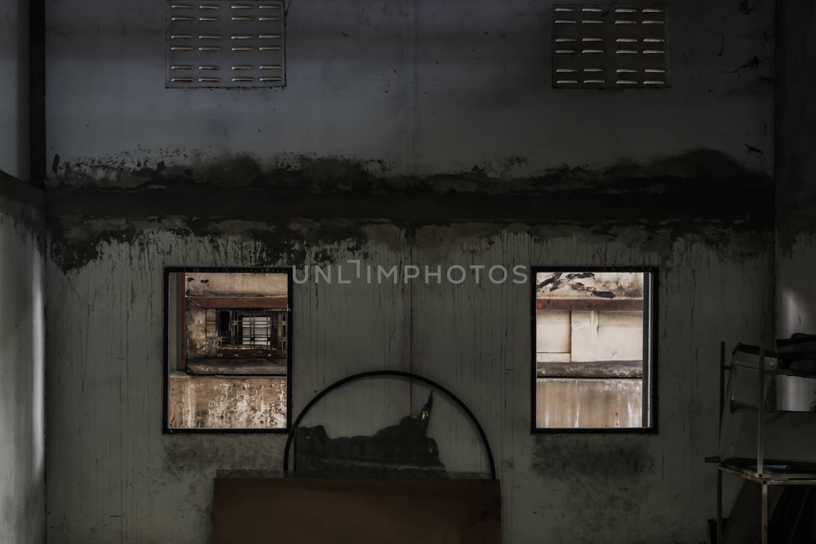 Abandoned room with two window was left to deteriorate over time, Abandoned house, Destroyed house, Ruined house. No focus, specifically.