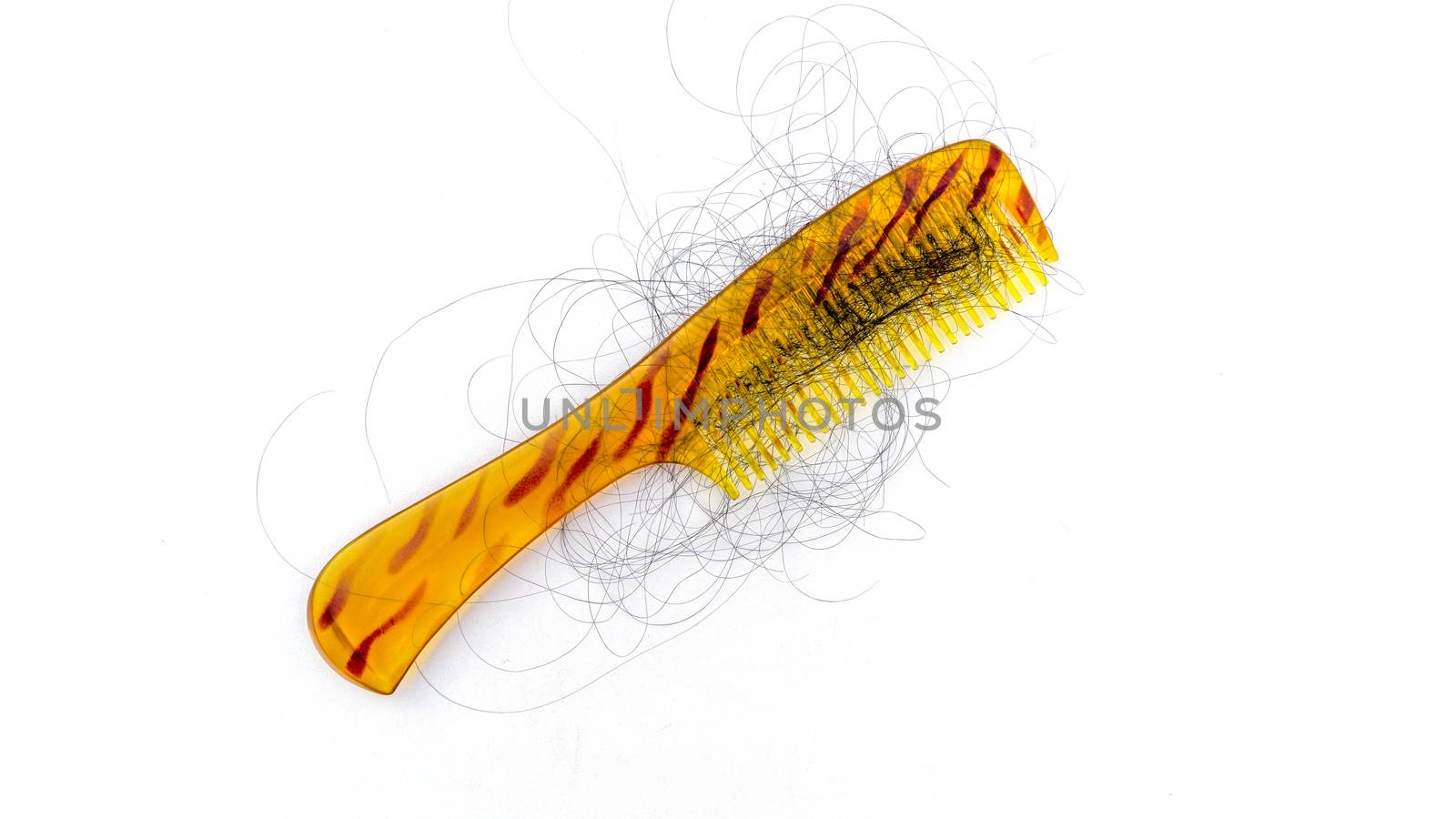 Golden comb with stripes and hair fall as well as dandruff. Phots demostration of hair loss while combing. by sonandonures