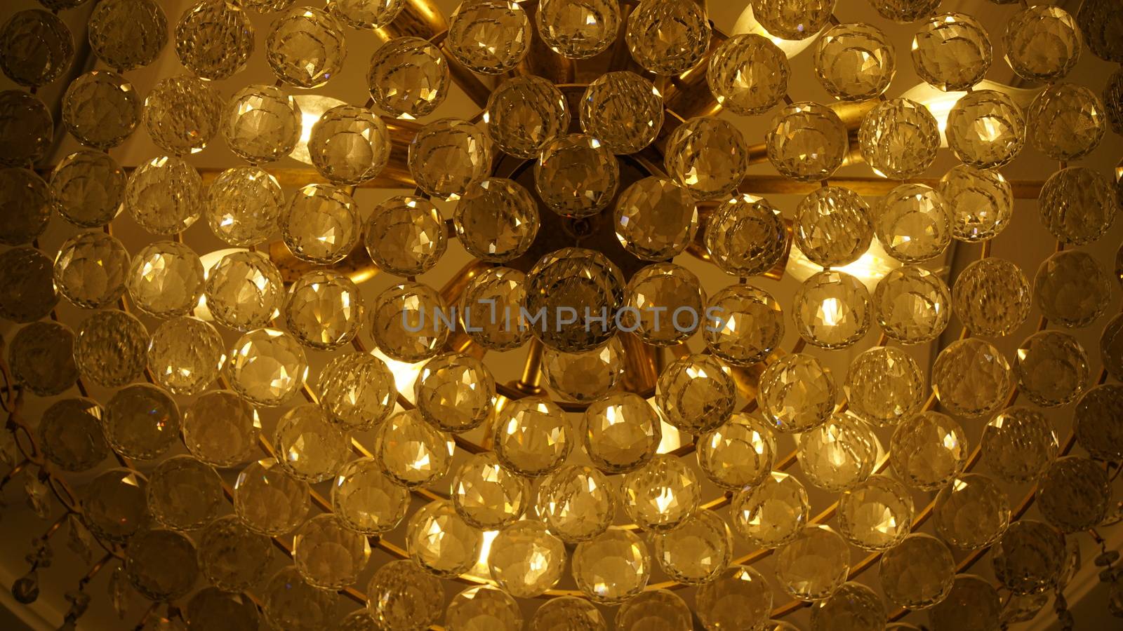Crystal ball chandelier decorated on a ceiling wall design