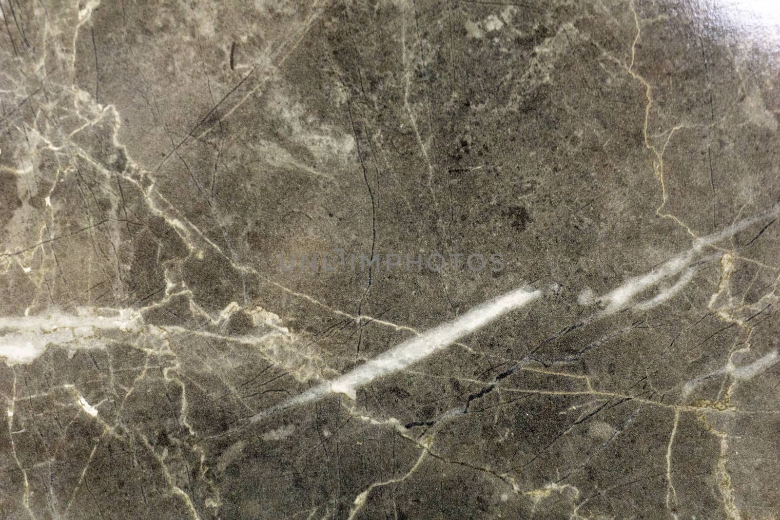 Brown marble background with white stripes and black patterns
