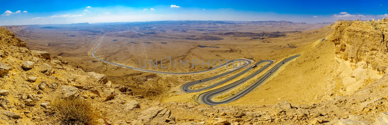 Panorama of cliffs, landscape, and hairpinned road, Makhtesh (cr by RnDmS