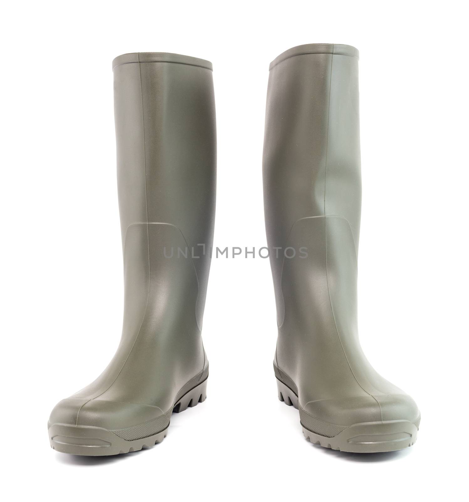 Pair of green clean rubber boots standing up, isolated on white background. Front view.