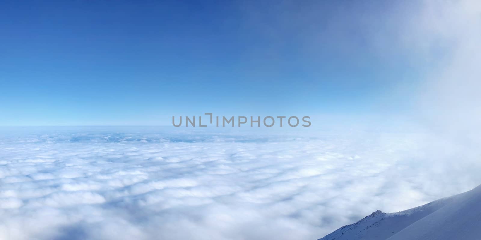 Temperature inversion forming sea of clouds seen from above, hig by Ivanko