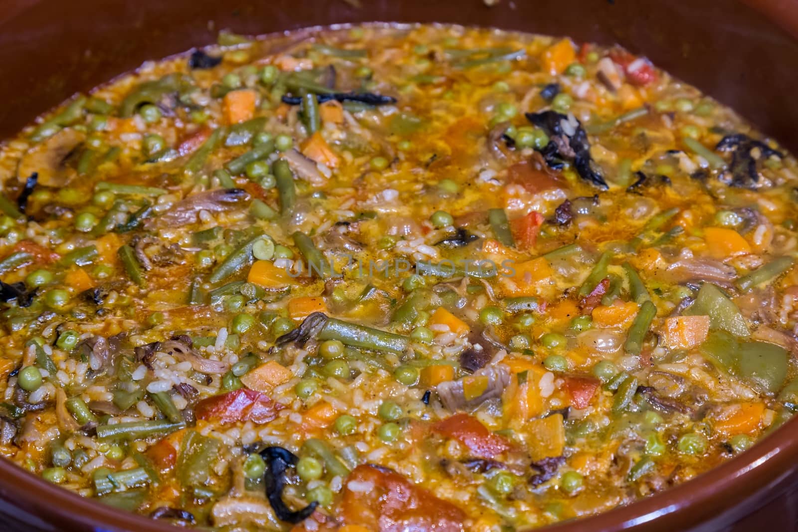 Close Up of Colorful and Fresh Vegetarian Paella Spanish Rice Dish by Digoarpi
