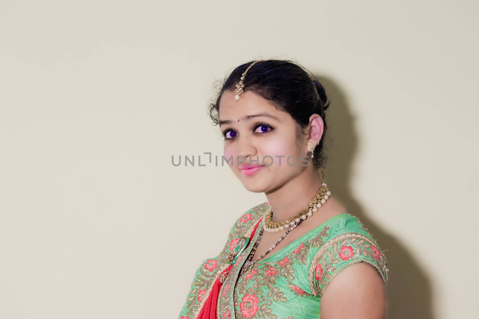 Hindu young attractive married girl and wearing gold affection of Indian culture