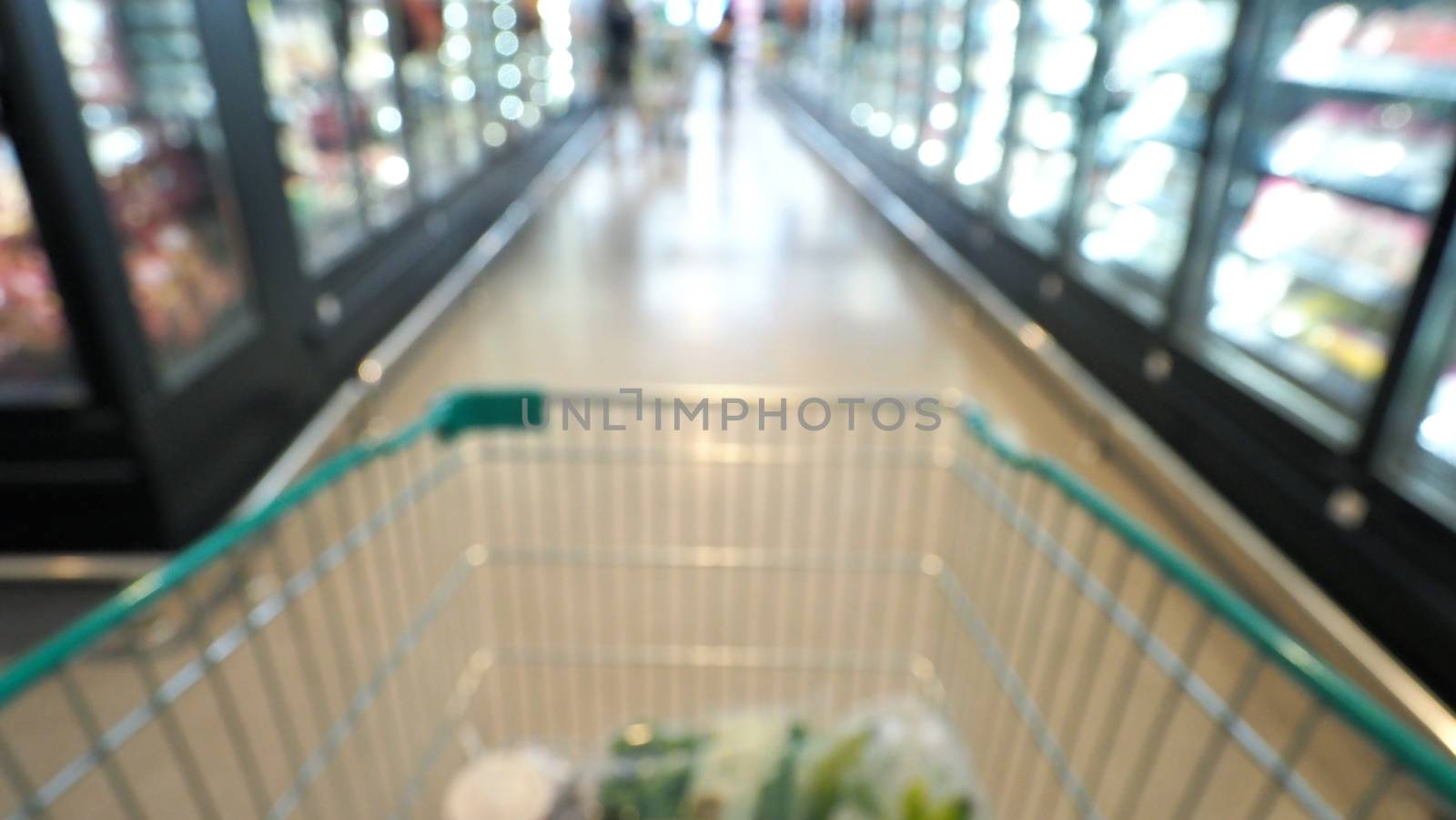 Blurry images of supermarket cart in big stores by gnepphoto