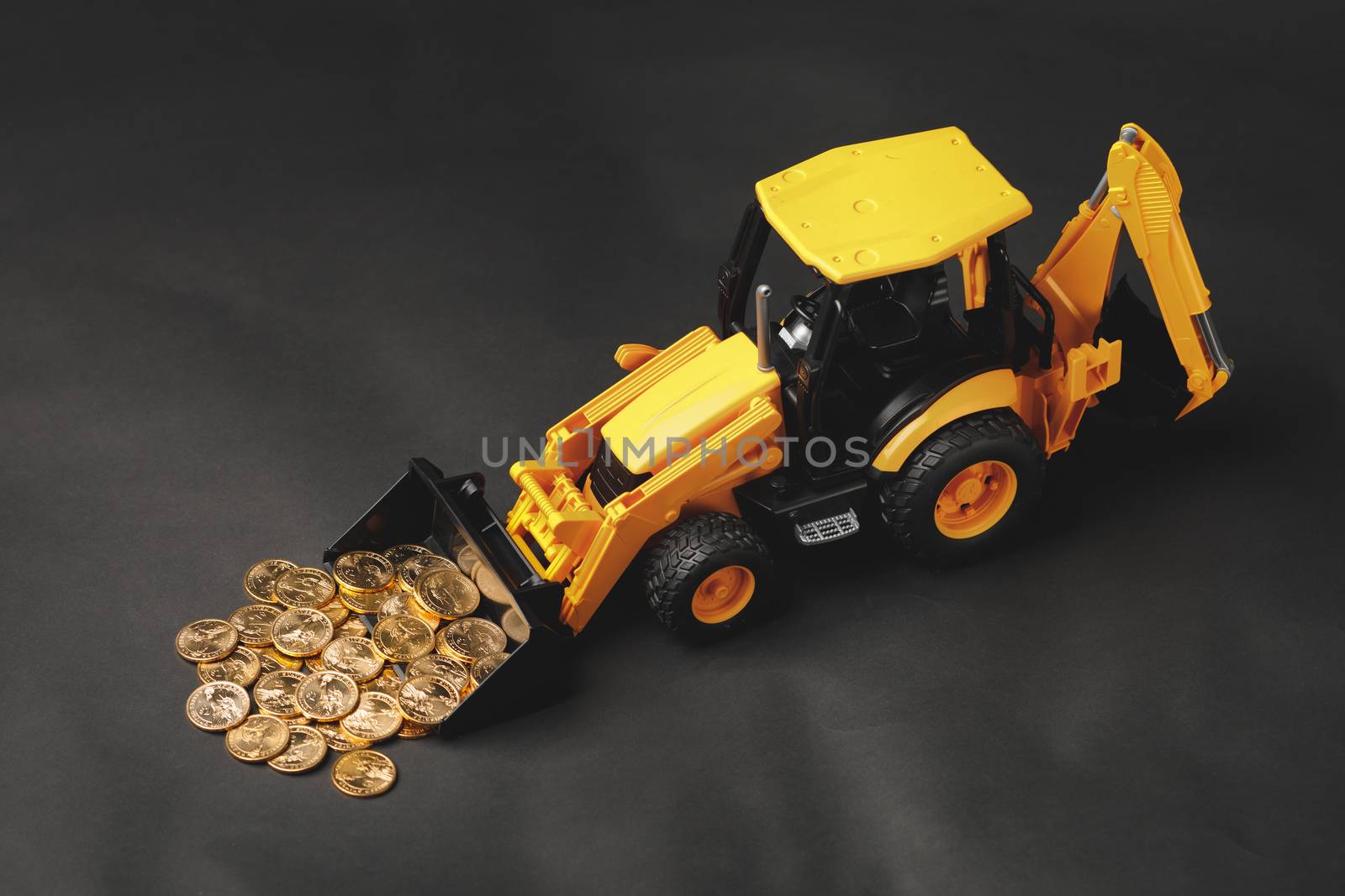 tractor rake up money coins with a bucket by nikkytok