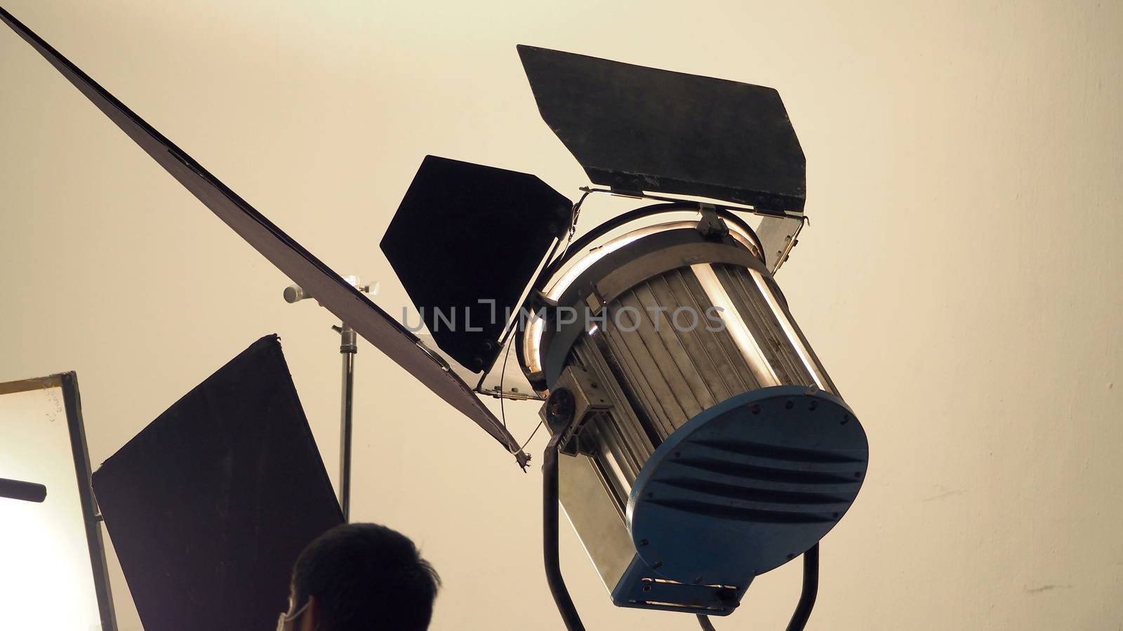 Big LED studio spotlight and tripod for vdo shooting. by gnepphoto