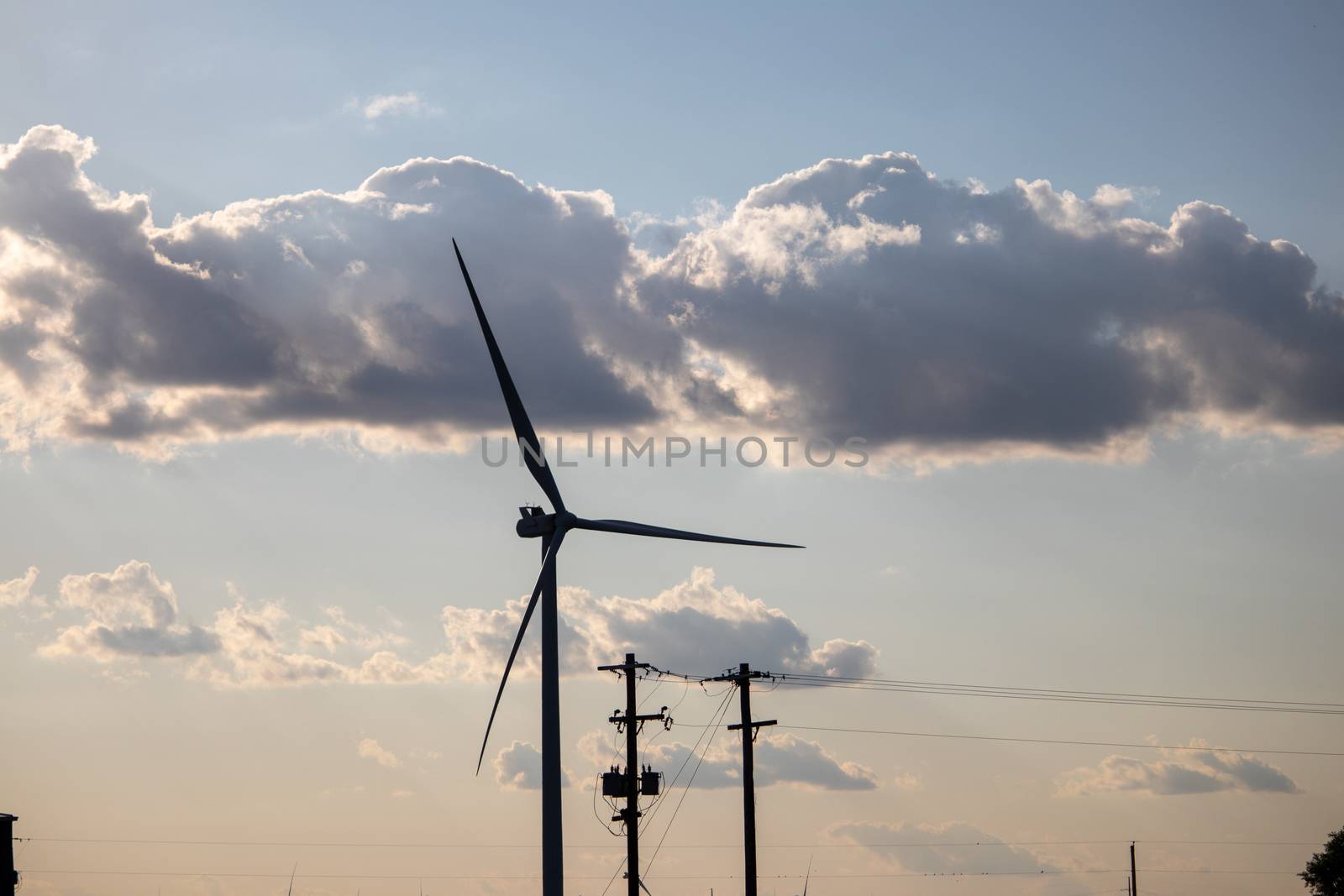 O'Neill, Nebraska, US July 22, 2019 Wind Farm In Nebraska Farm Land Wind Power Turbine Up Close. Wind turbines across Nebraska farm lands