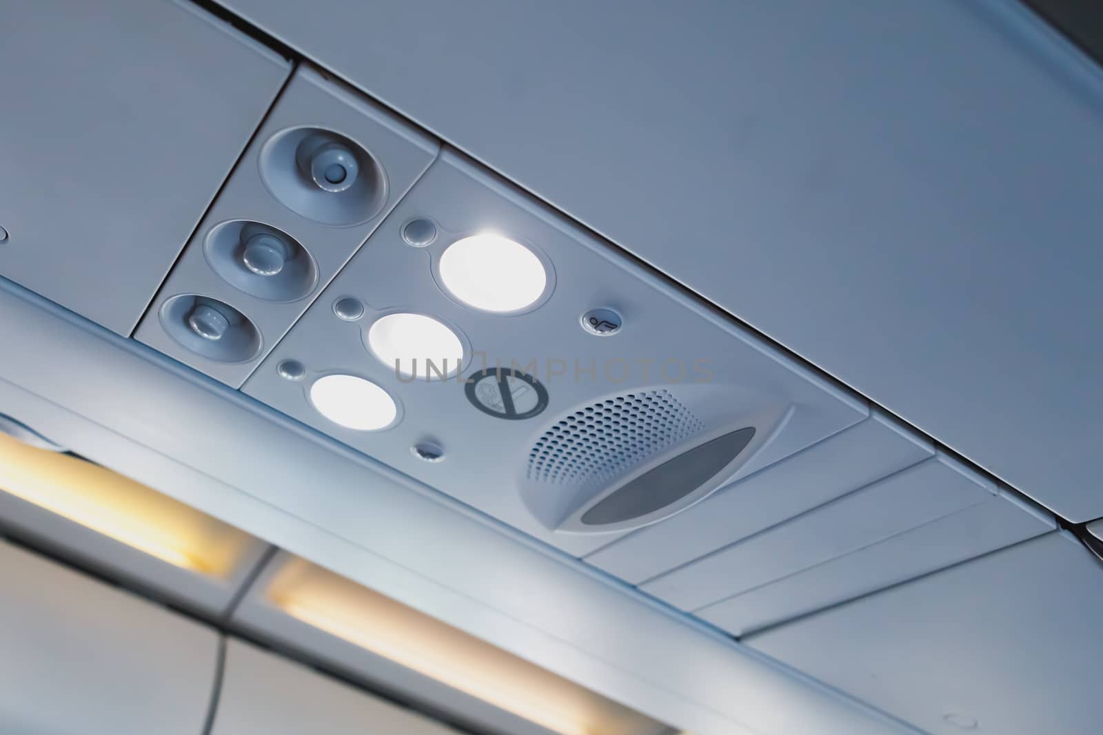overhead light and air conditioner in airplane cabin by nikkytok