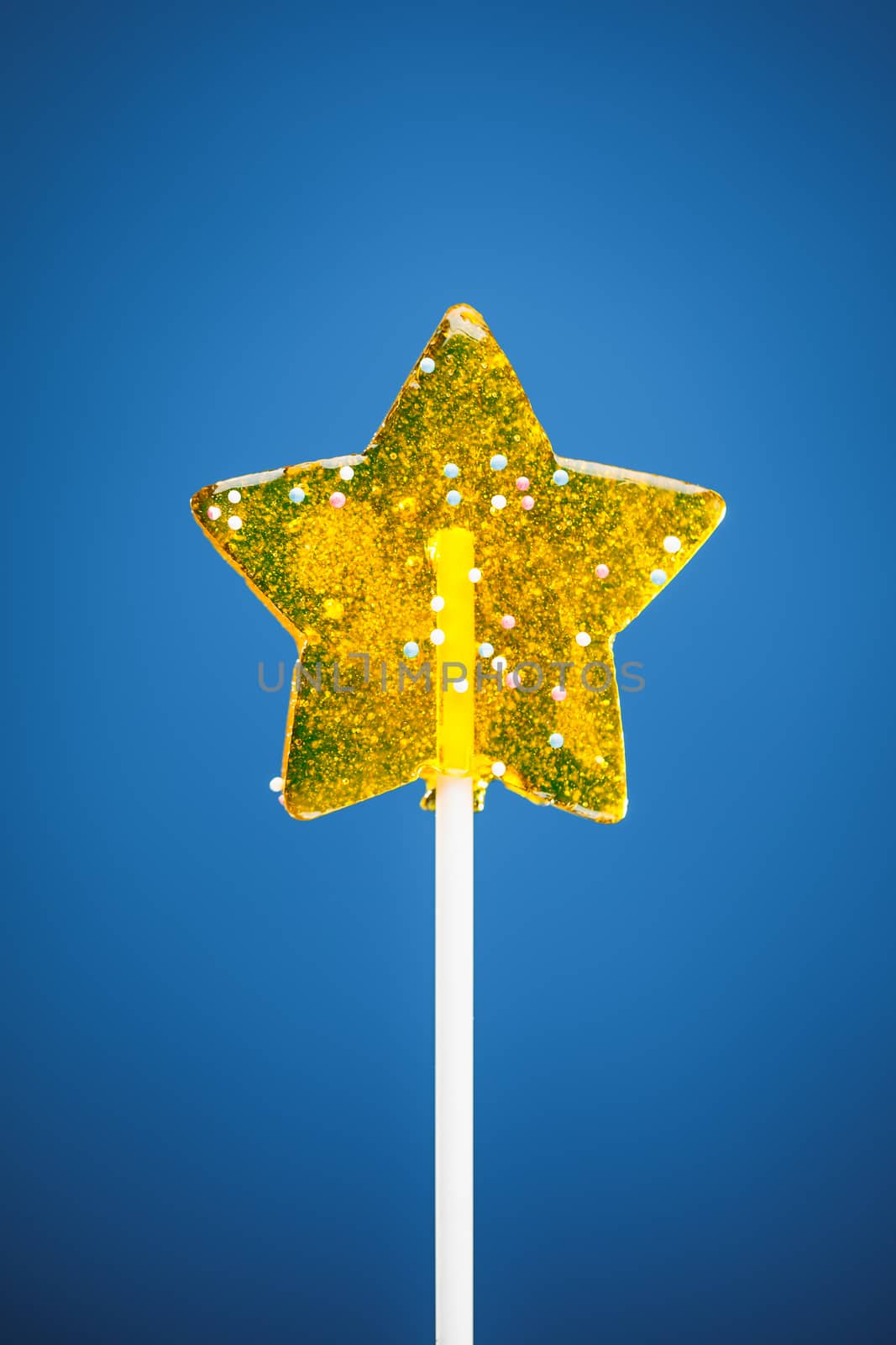 yellow star candy, blue background