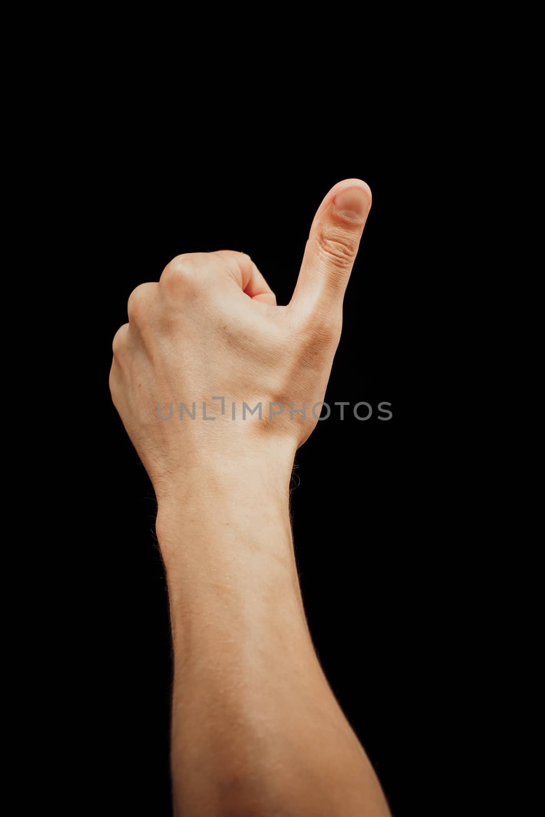 thumbs up male hand, isolated on black by nikkytok