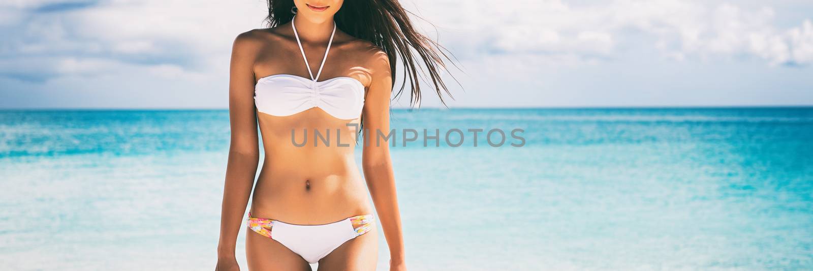 Beach bikini body woman with sexy abs and fashion swimsuit for spa and laser treatment concept - panoramic banner by Maridav