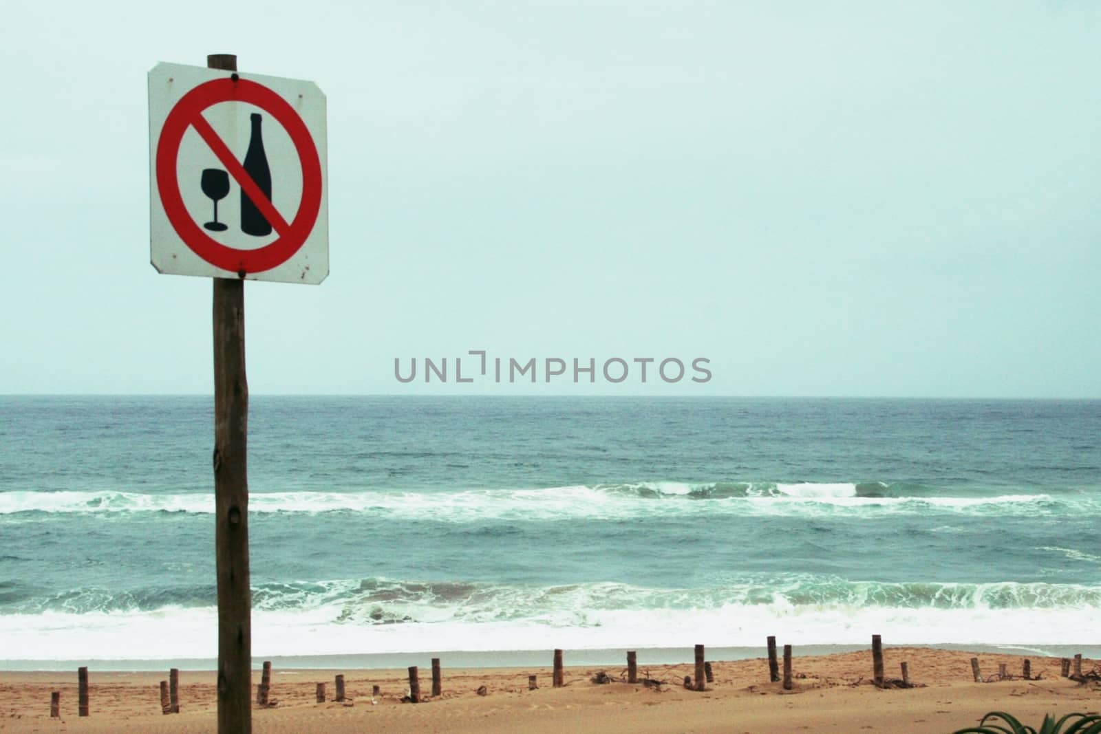 Alcohol is forbidden to drink sign table at the beach by balage941