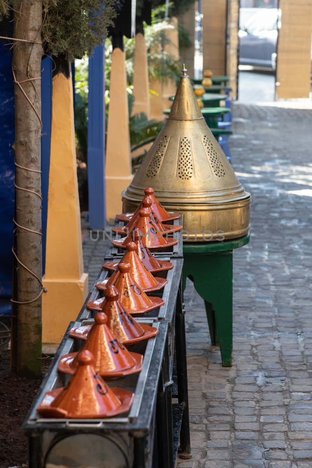 Tagines lined up as display outside restaurant Casablanca Morocco by kgboxford