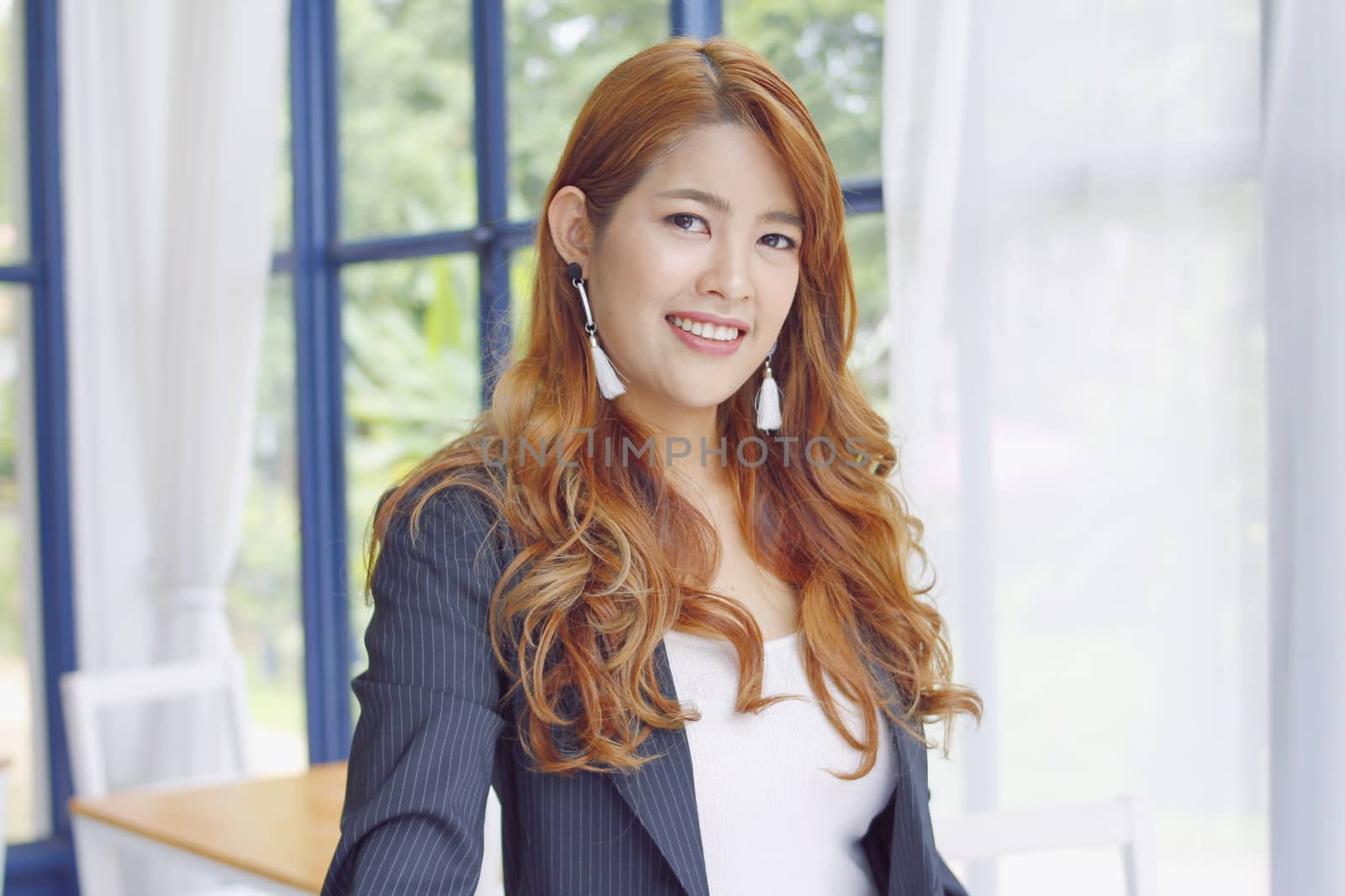portrait of a business woman smiling and beautiful