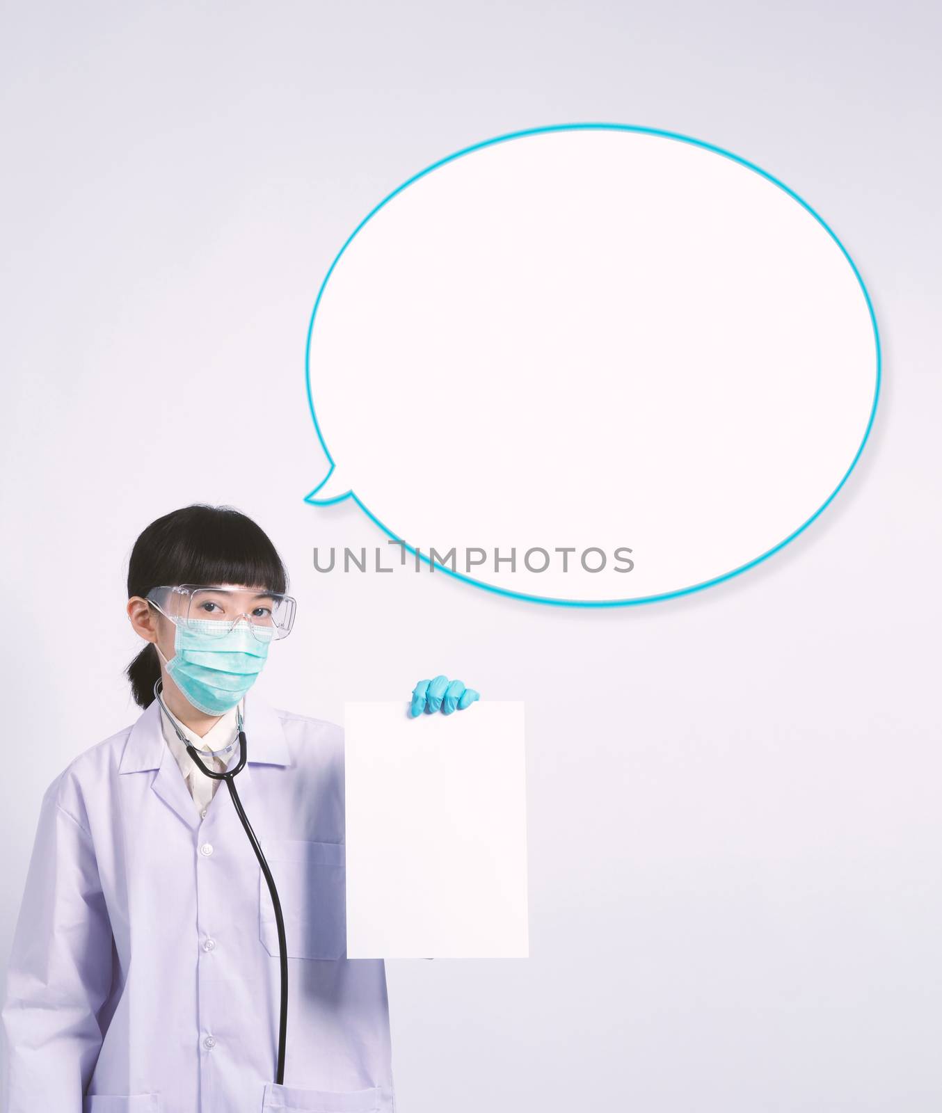 Asian woman doctor holding a blank paper in hand and copy space by gnepphoto
