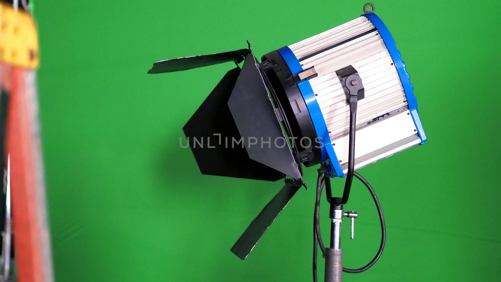 Big studio LED spotlight for video production by gnepphoto