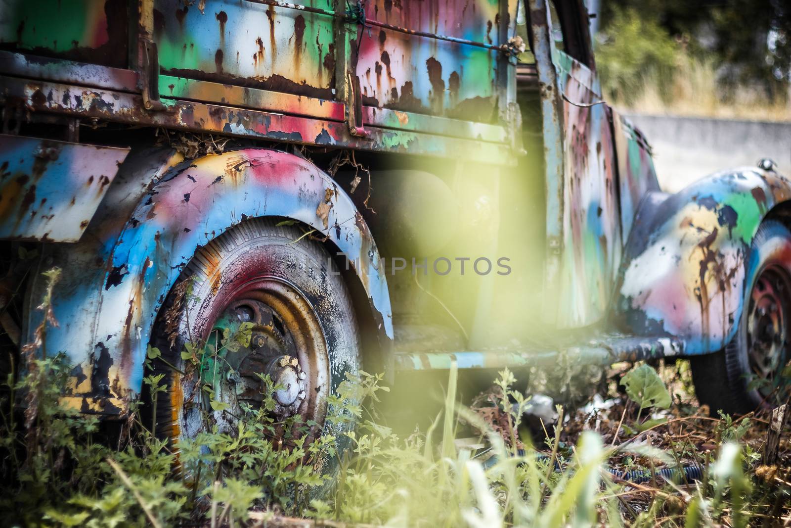 The wreckage of a truck painted with bright colors