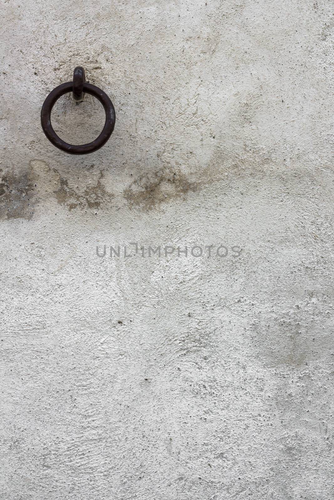 Medieval ring on the facade of an old building.
